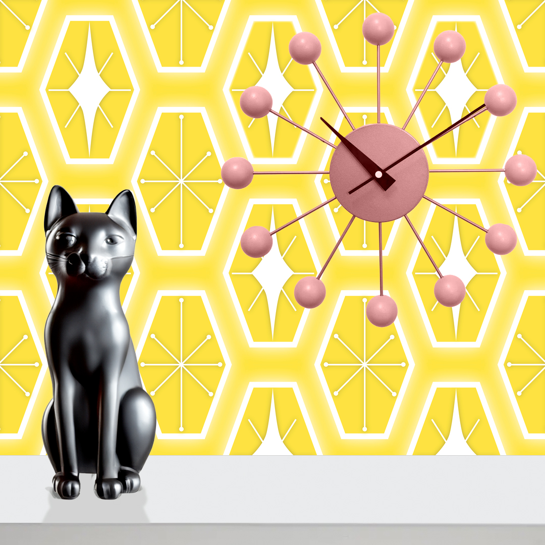 The artwork consists of a repeating geometric pattern featuring hexagonal shapes filled with two different designs. One design inside the hexagons includes a symmetrical starburst or asterisk-like figure with lines radiating from a central point, each line ending in a small circle. The other design features a white diamond shape with extended pointed ends within the yellow hexagon. These hexagons are outlined with a white border and set against a soft yellow background creating a vibrant, retro aesthetic. The use of yellow, white colors, along with the symmetrical arrangement, gives the pattern a mid-century modern, playful style.